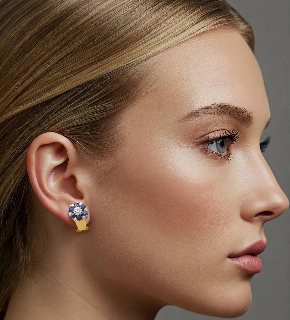 pendientes de oro con zafiros foto con modelo IA