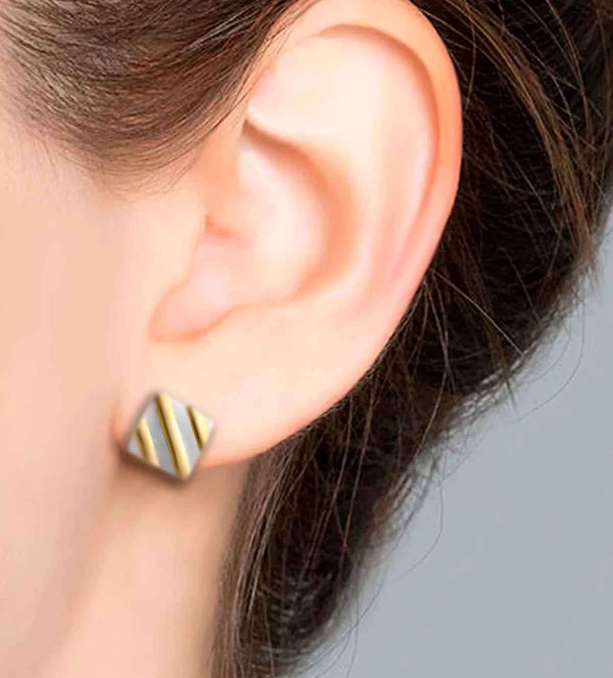 Pendientes de oro y acero "Fusión" pendientes de oro y acero fotograma con modelo