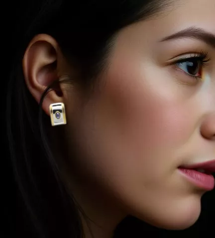 pendientes de oro y acero con zafiro ESCUDO toma modelo mujer IA