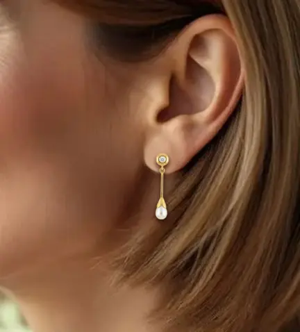 pendientes-de-oro-y-perla-cultivada-083_JI076 modelo mujer