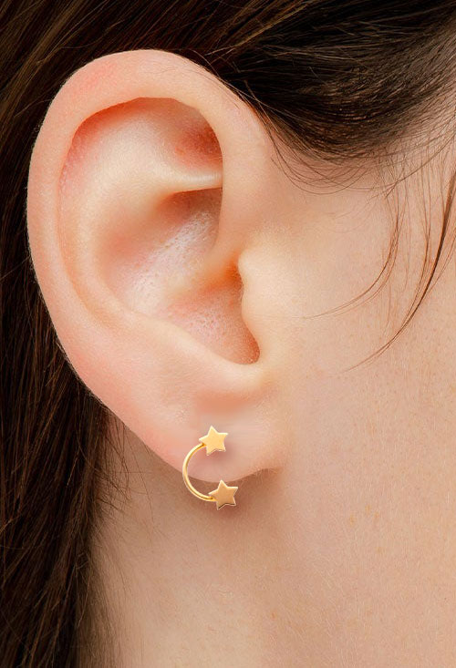 Pendientes oro amarillo 18 ktes estrellas 059_8678-201 pendientes oro 18 kilates modelo estrellas foto para web joyeria online el rubi joyeros toma modelo