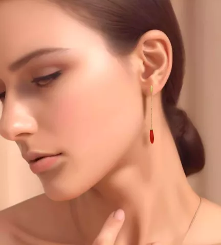 pendientes de oro y coral fino Atolón con modelo femenino