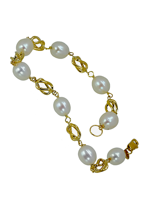 Pulsera en oro amarillo de 18K con perlas y entrepiezas. 025_F-01219 Pulsera en oro amarillo de 18K con perlas y entrepiezas - foto 1 - rfcia.025_F-01219