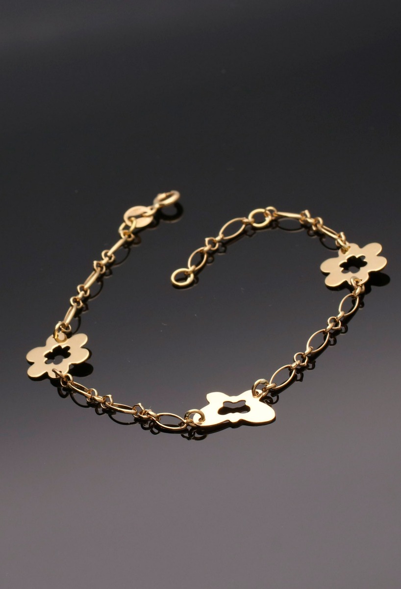 Pulsera oro amarillo para mujer entrepiezas 003_P49502 pulsera oro amarillo 18 kilates entrepiezas flores y corazon vista en modelo precio barato joyeria online 003_P49502_04 foto sin recortar