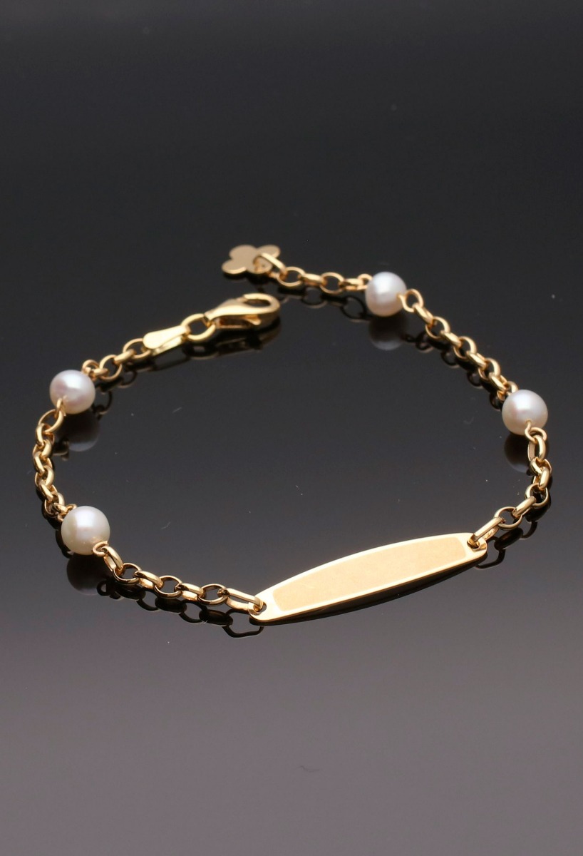 Pulsera oro 1ª Comunión. 045_48306148 pulsera de oro 18k con perlas cultivadas fotografia fisica sin retoques fondo negro