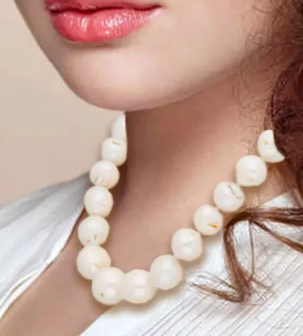 collar de perlas barrocas en disminucion