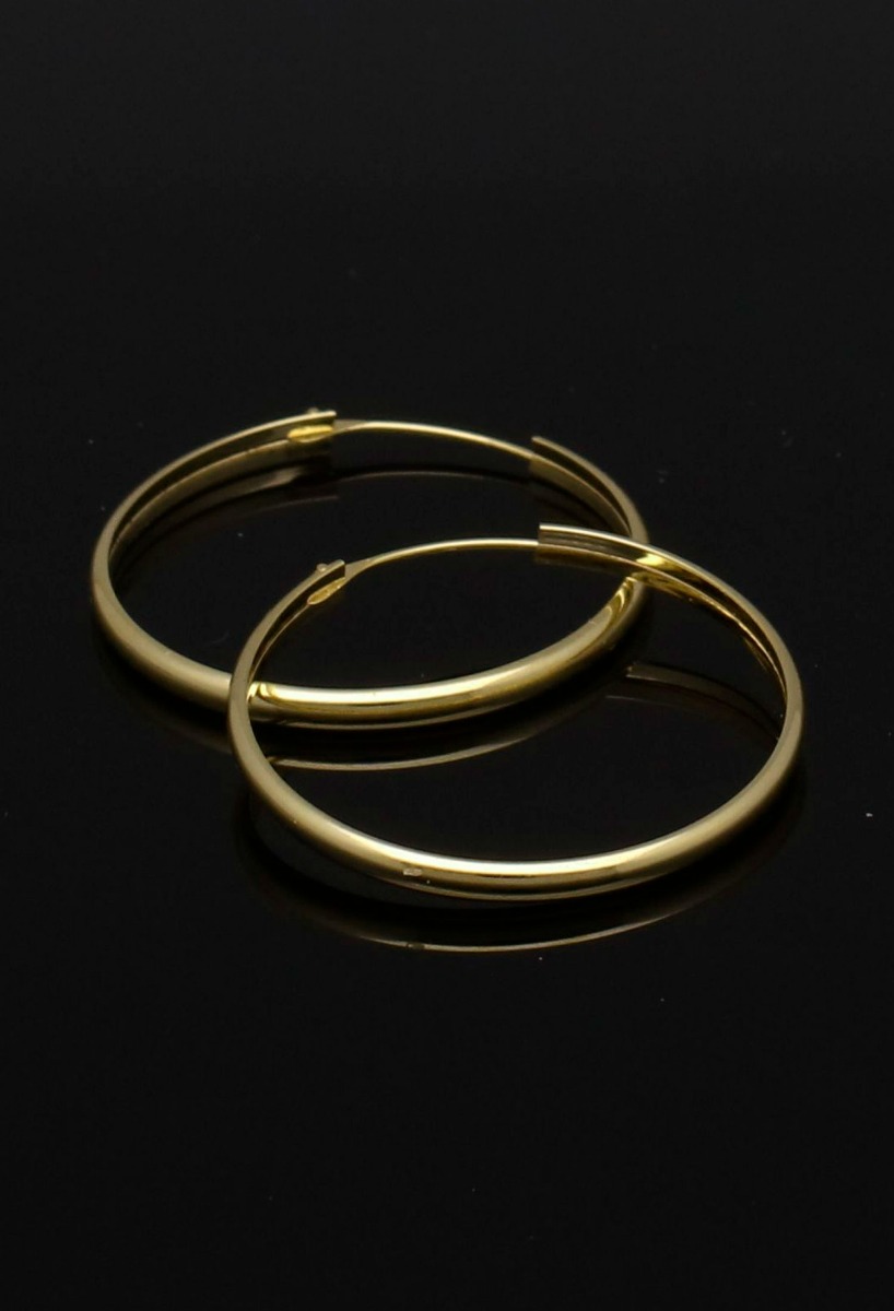 Pendientes de aro oro amarillo 18 ktes. 030_212-R criollas oro amarillo 18 ktes chanela media caña 20mm de diametro exterior foto sin recortar fondo negro para web el rubi joyeros