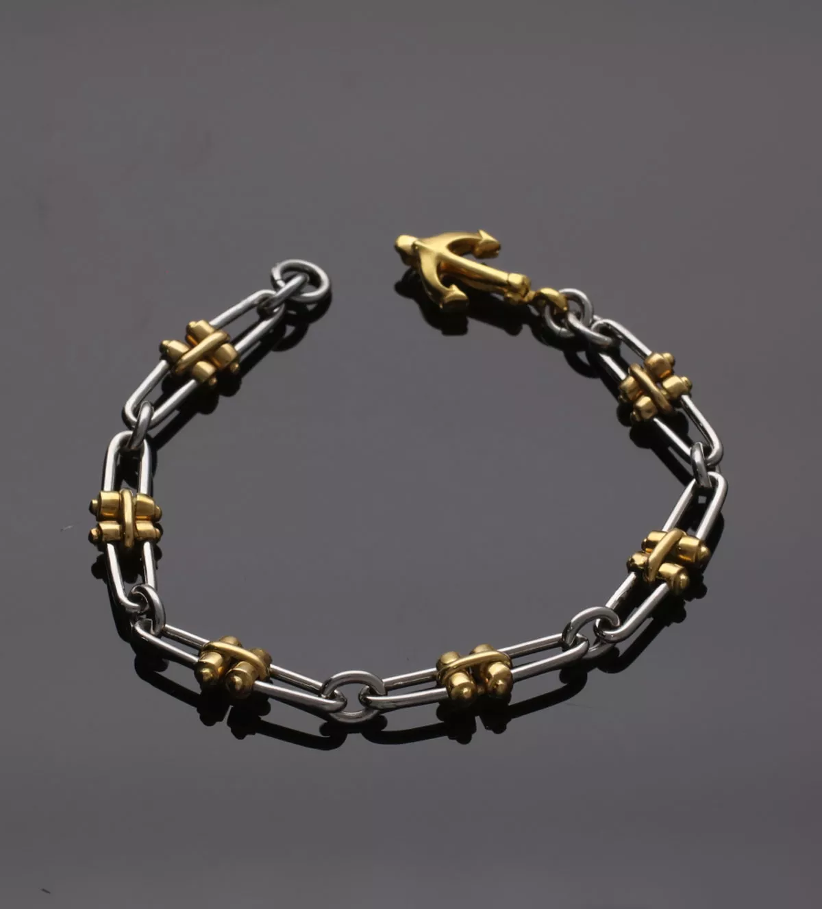 Pulsera de oro y acero INDUSTRIAL pulsera de oro y acero industrial toma sin retoque