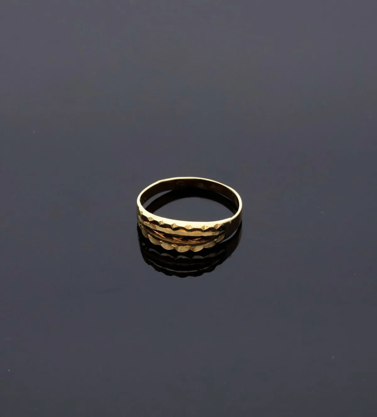 Anillo de oro 18K para bebé 083_095 anillo de oro 18k para bebe 083_095_05 foto sin retoque