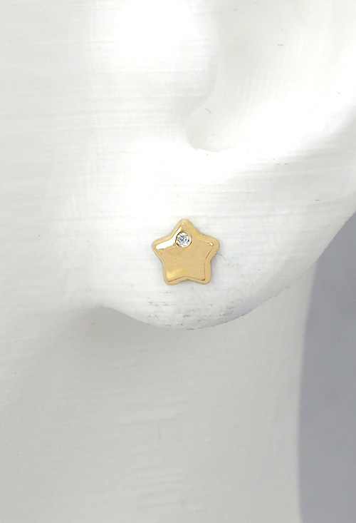 Pendientes de estrella con 5 puntas en oro amarillo de 18 kilates con circonita y sistema de tuerca peto