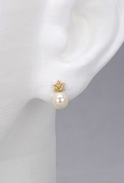 pendientes perla y circonitas motivo estrella foto modelo oreja 052_041-P-P_02