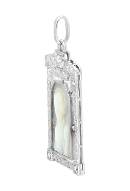 medalla oro blanco diamantes y nacar joya exclusiva foto lateral