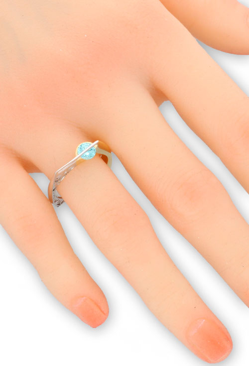 Anillo de plata bicolor con circonita Azul 313_61051 Anillo de plata bicolor con circonita Azul 313_61051 puesta en mano