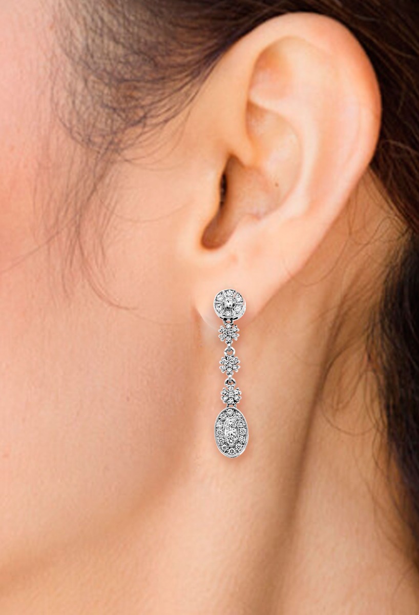 Pendientes largos oro blanco 18 ktes con brillantes 231_W757E pendientes largos oro blanco 18 kilates fotografia modelo para web el rubi joyeros