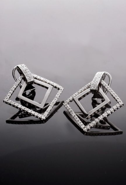 pendientes de oro blanco y diamantes foto sin recortar fondo negro web el rubi joyeros