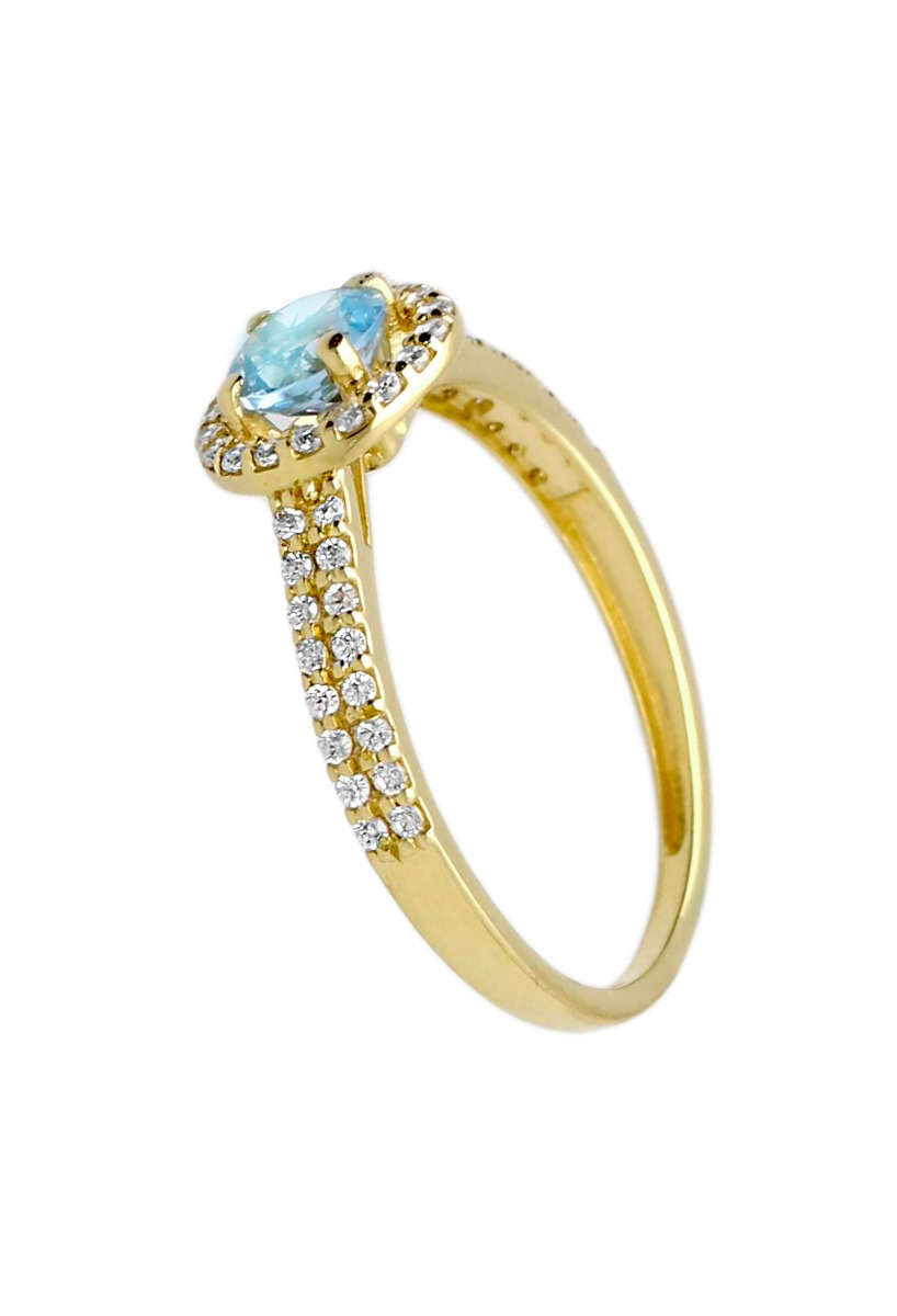 anillo oro amarillo 18 kilates con topacio azul rodeado de circonitas fotografia lateral