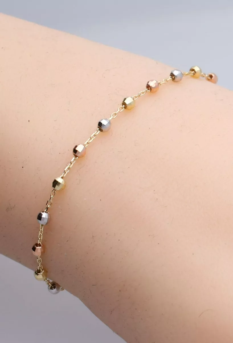 Pulsera de oro 18 ktes tricolor 289_01531216PU pulsera oro tricolor 18 ktes foto muñeca maniqui