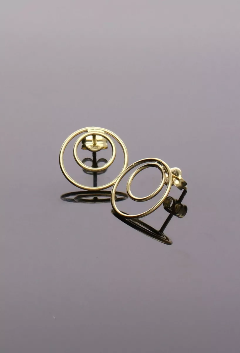 Pendientes en oro 18k círculos concéntricos 002_56112-P Pendientes en oro 18k círculos concéntricos 002_56112-P fondo negro