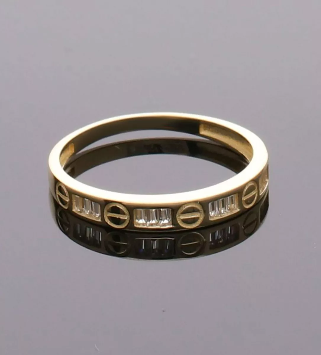 Anillo oro amarillo 18 ktes con circones baguette 243_475-01294 anillo de oro amarillo 18 ktes con circonitas talla baguette toma sin retoques