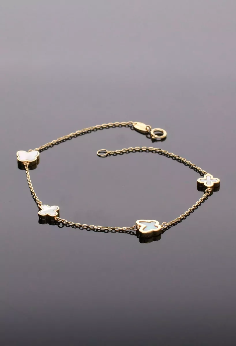 Pulsera de oro amarillo 18 ktes y nacar, entrepiezas mariposas y cruces foto sin recortar