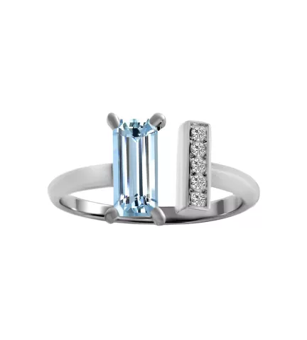 Anillo de oro blanco con topacio azul de 1,23 ct y 5 diamantes talla brillante. Diseño abierto, elegante y exclusivo