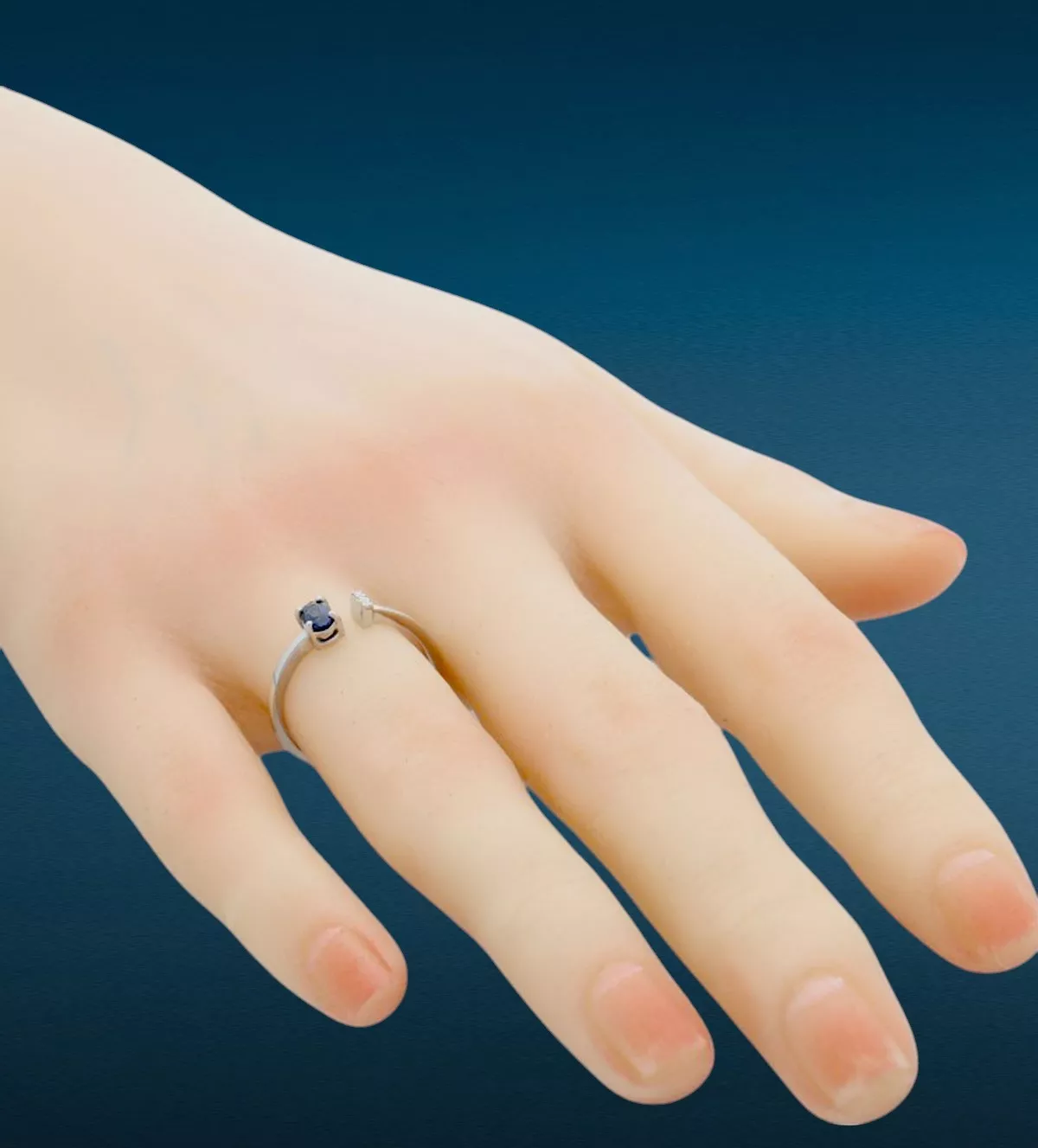 Anillo de oro blanco 18 ktes "Azul Anochecer" anillo de oro blanco con zafiro y diamantes anochecer azul vista mano maniqui