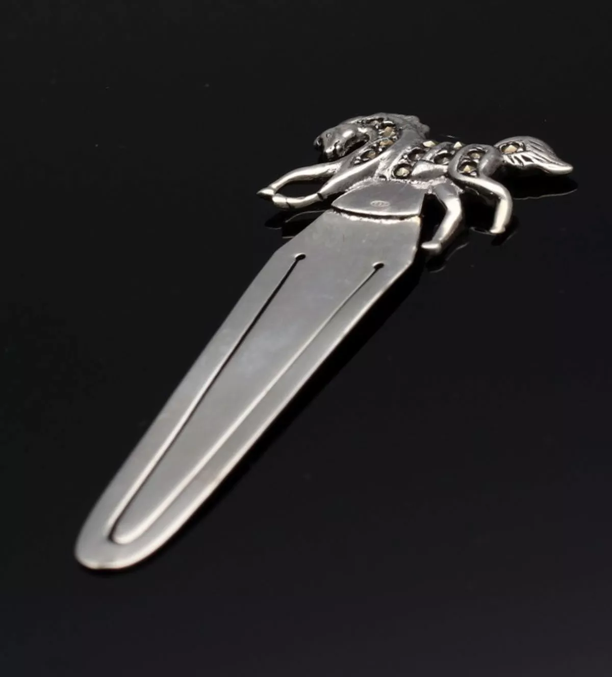 Punto de libro de plata 297_5007919 punto de libro de plata caballo con marquesitas foto sin retoque