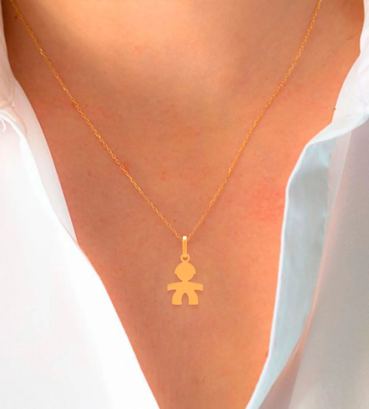 Colgante de oro 18 ktes NIÑO 243_447-00135 243_447-00136 colgante de oro niño foto con modelo mujer