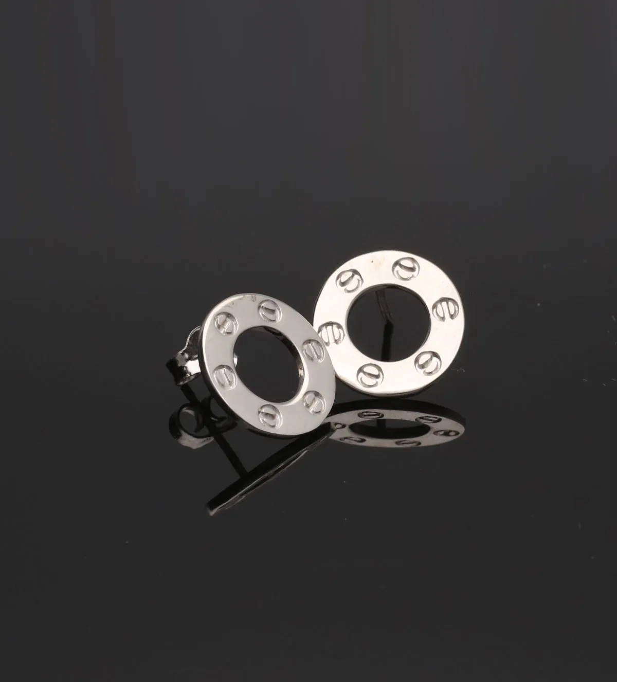 Pendientes de plata circulares 266_0110957-1-1-15MM pendientes-de-plata-266_0110957-1-1-15MM_05 fondo negro sin retoque