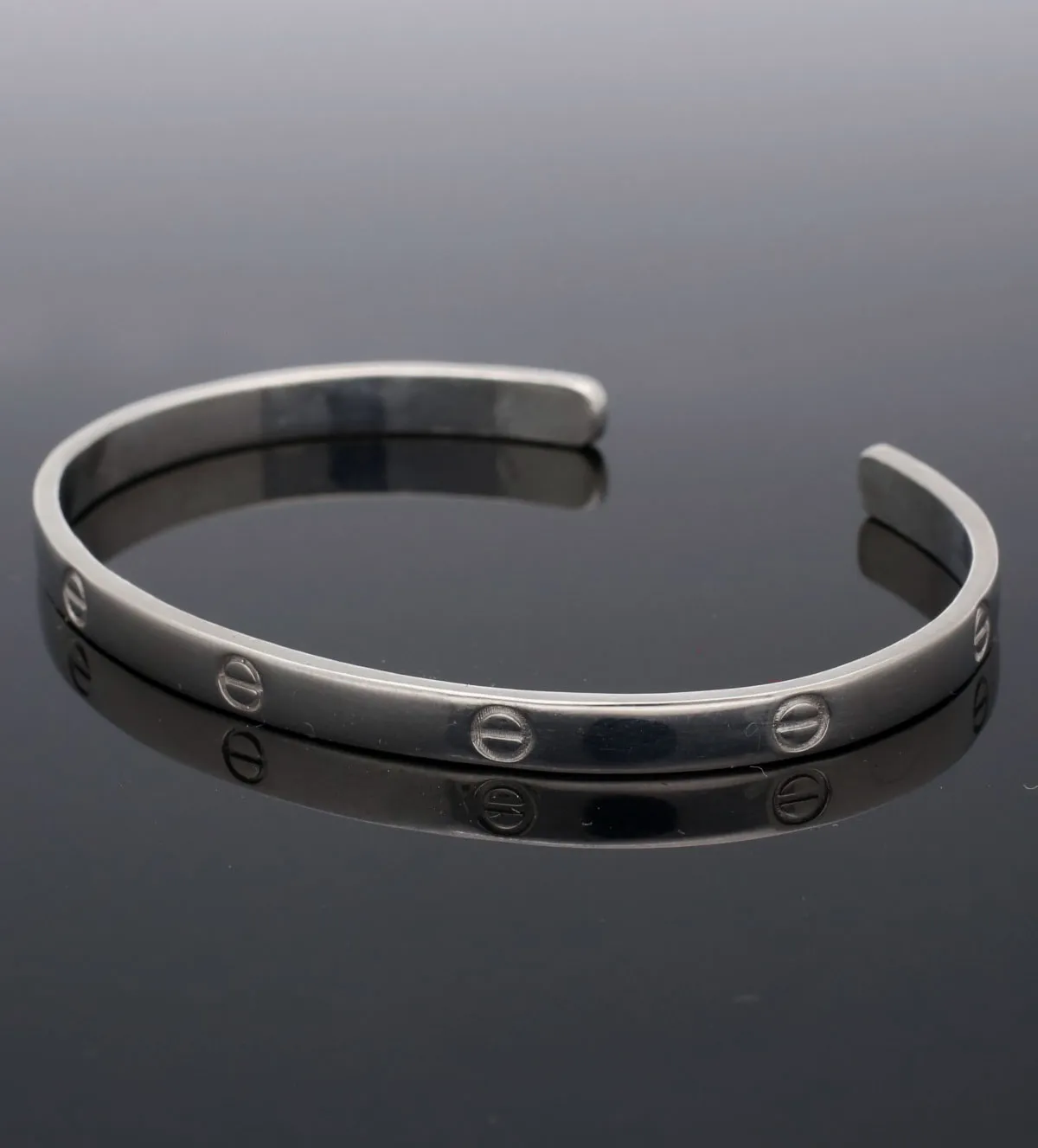 Pulsera de plata rígida tornillos 266_0410956-1-1-BRAZ pulsera-de-plata-266_0410956-1-1-BRAZ toma real sin retoque